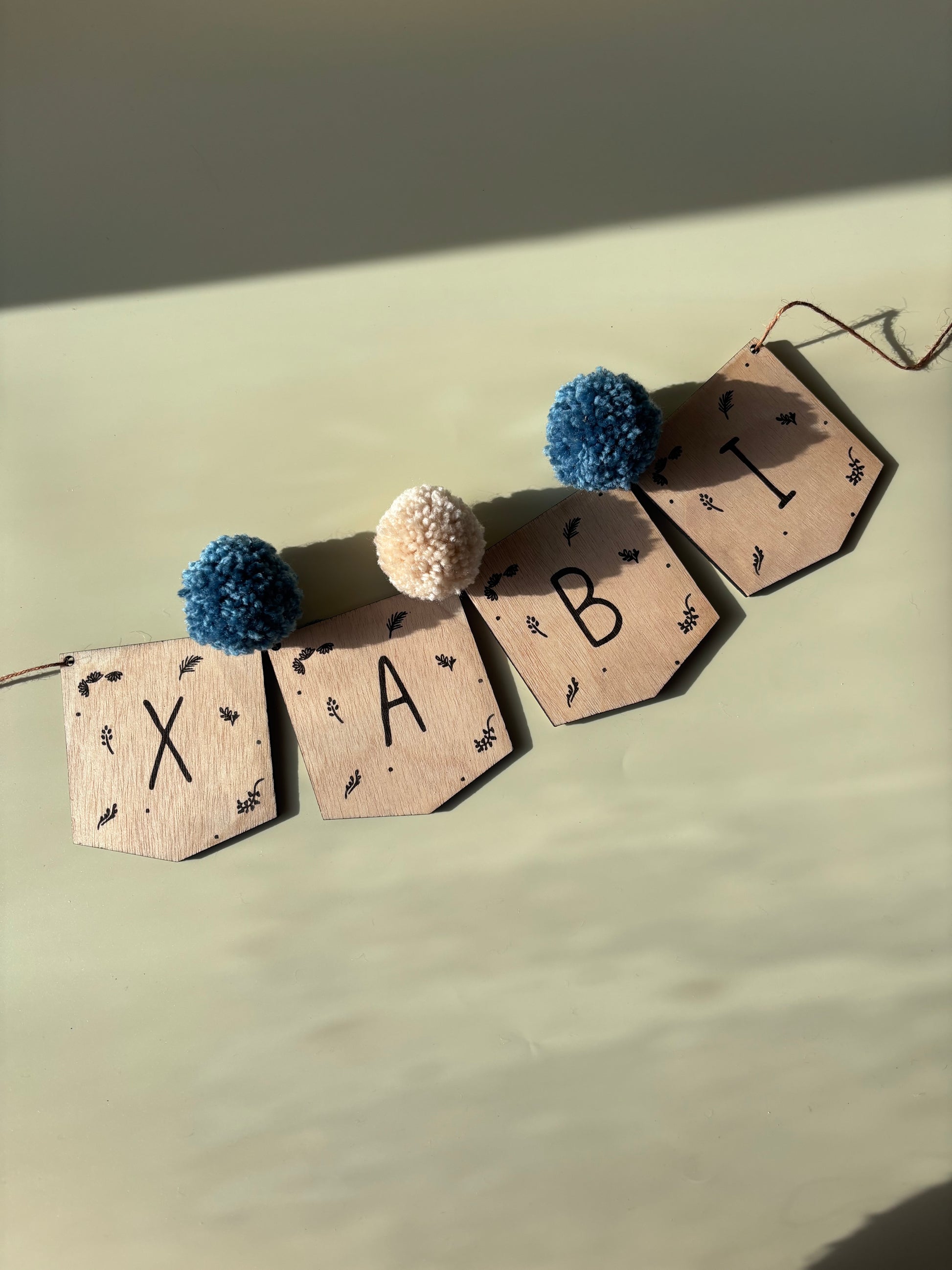 Guirnalda madera nombre