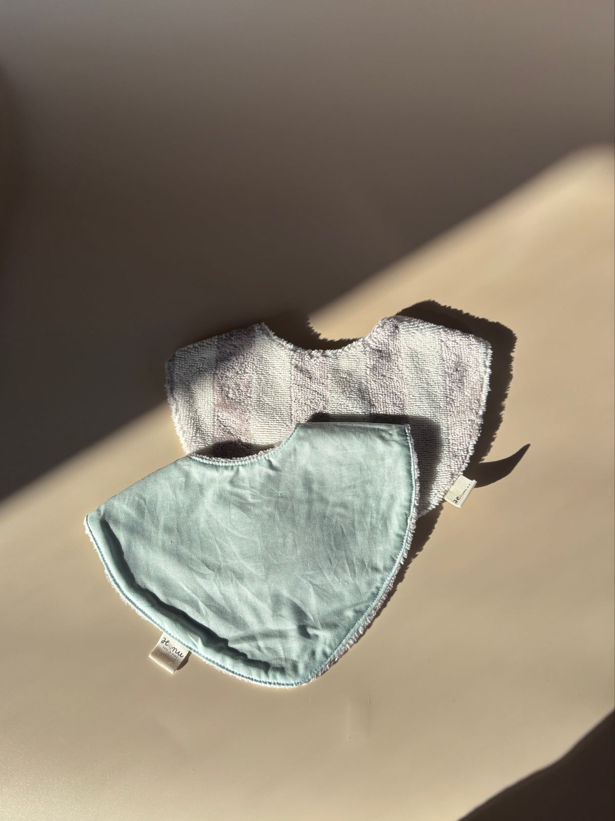 Pack baberos: rayas turquesa y beige
